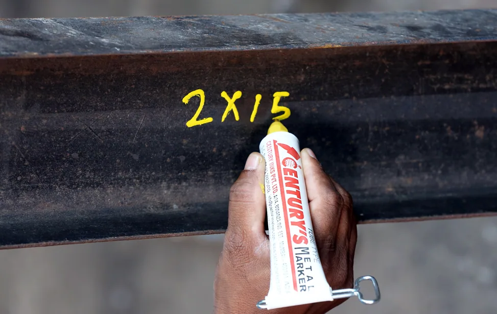 Century marker on metal